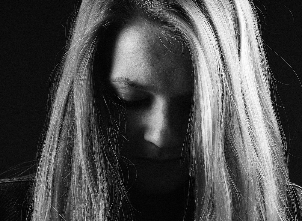 Woman sad and in emotional pain from toxic divorce