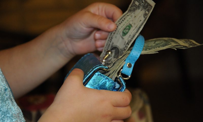 money coming out of purse to pay attorney fees