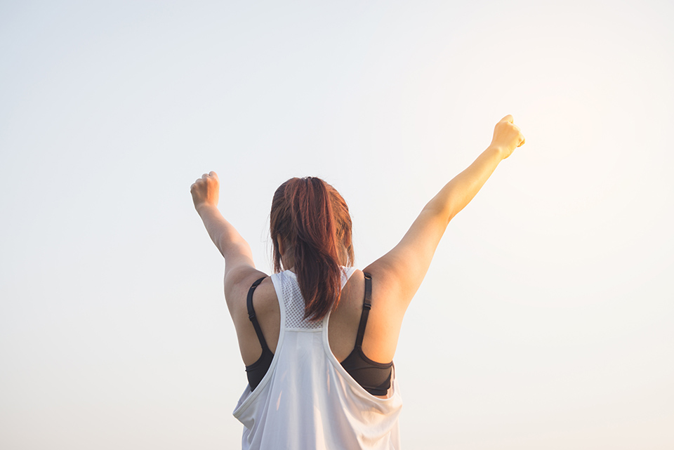 woman arms up